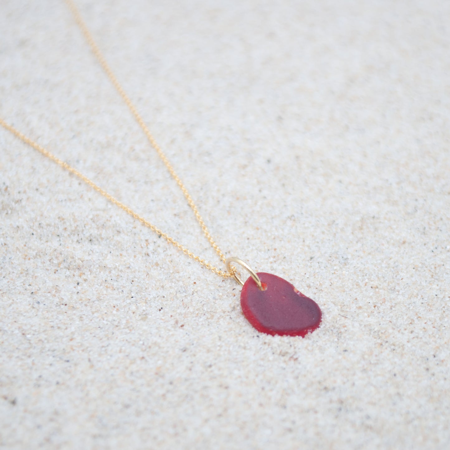 Meerglaskette rot und gold